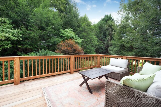 deck featuring an outdoor living space