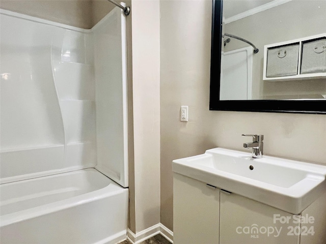 bathroom featuring sink and bathtub / shower combination