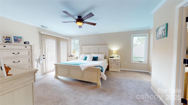 bedroom featuring ceiling fan, light colored carpet, and ornamental molding