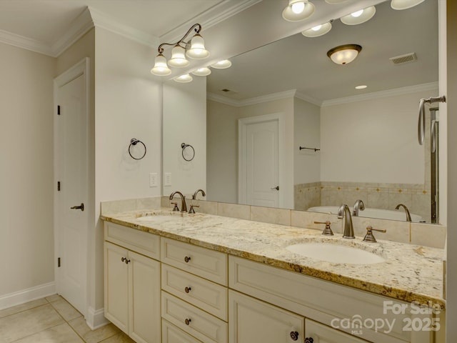 bathroom with tile patterned flooring, vanity, a bathing tub, and crown molding