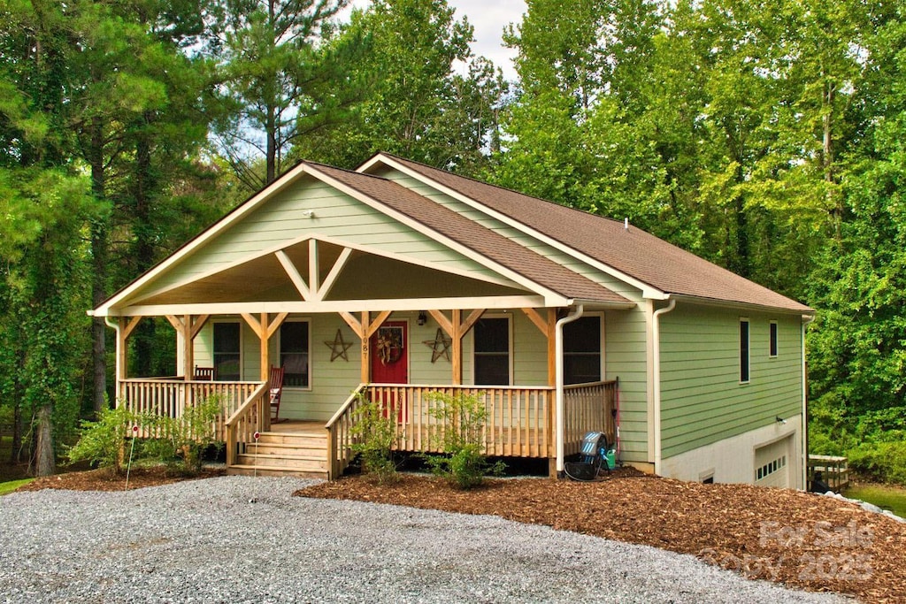 view of front of home with a garage and covered porch