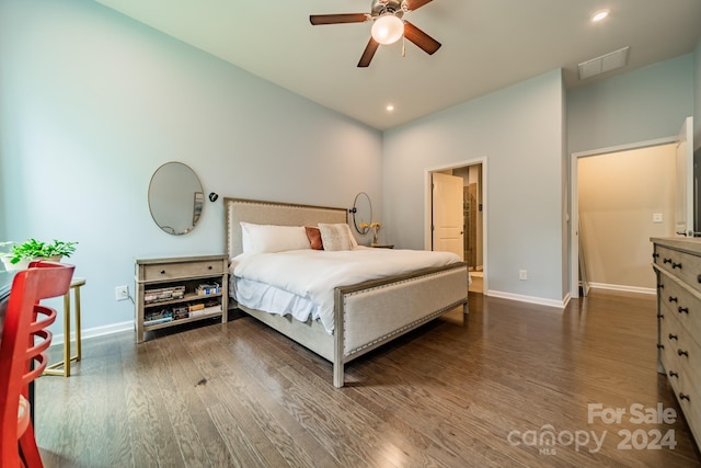 bedroom with ceiling fan and dark wood-type flooring