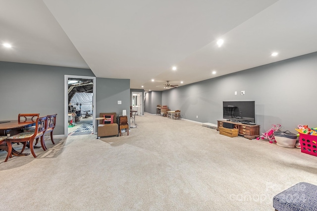 playroom with light carpet and ceiling fan