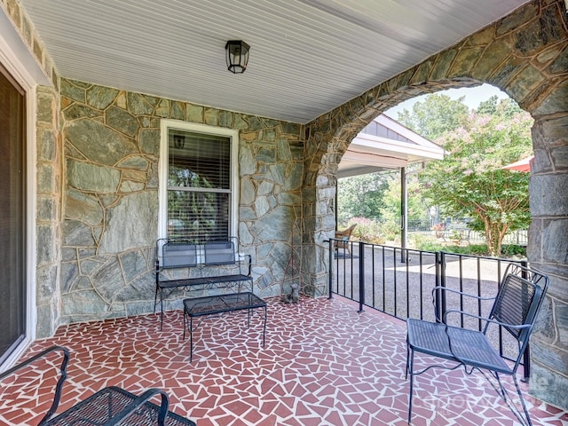 view of patio featuring a porch