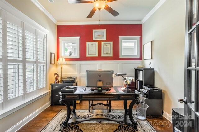 office space featuring ceiling fan, dark hardwood / wood-style floors, and ornamental molding