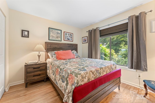 bedroom with light hardwood / wood-style floors