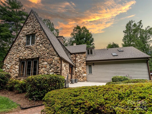 view of front of property with a patio