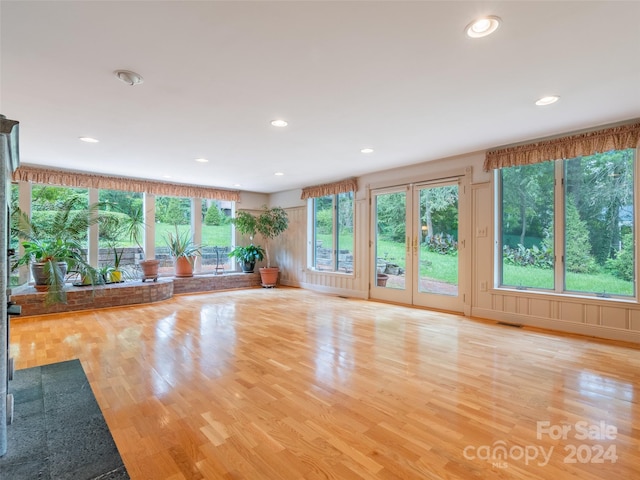 unfurnished living room with light wood-type flooring