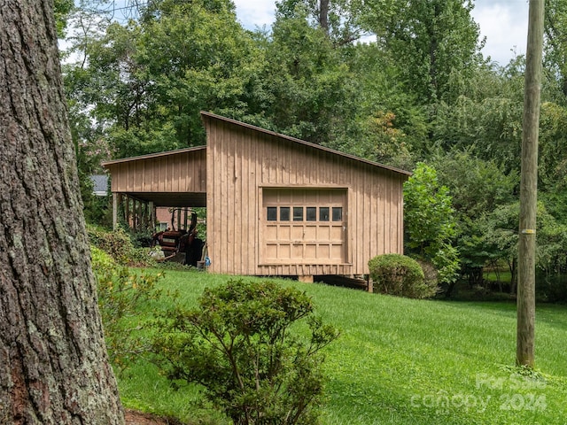 exterior space with a yard and a carport