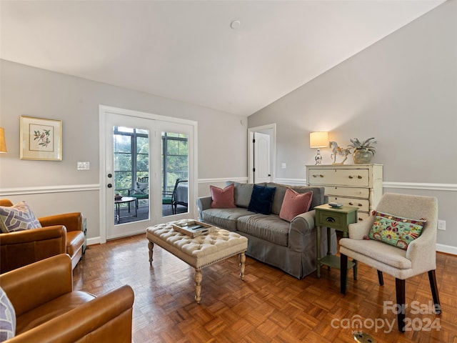 living room featuring lofted ceiling and parquet floors