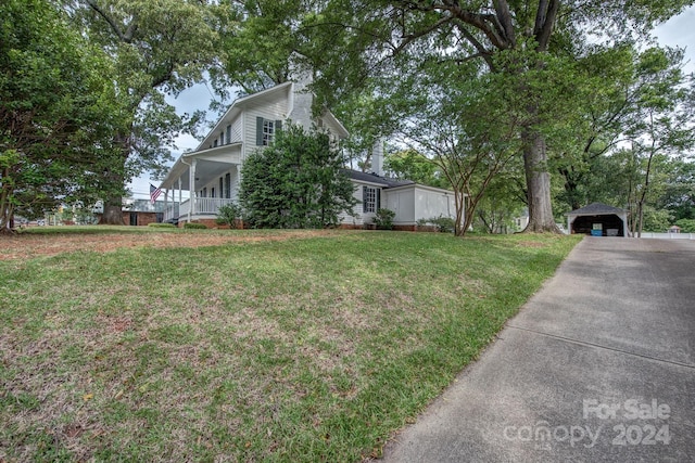 view of yard featuring a porch