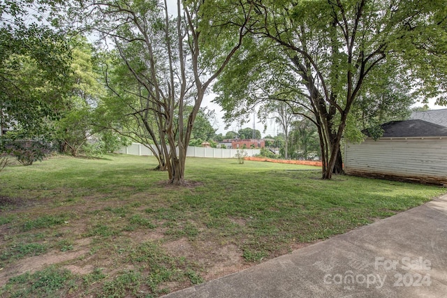 view of yard with fence