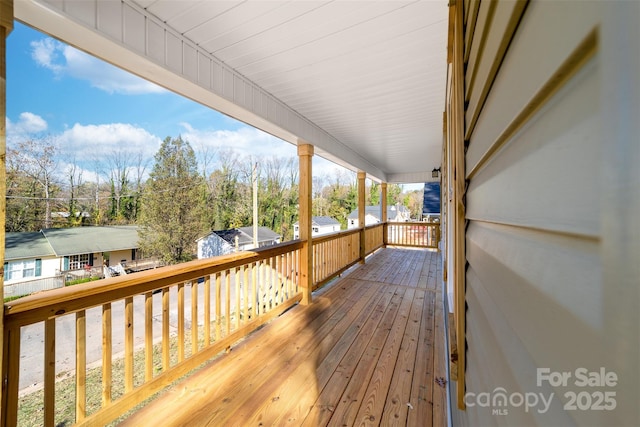 wooden deck with a porch