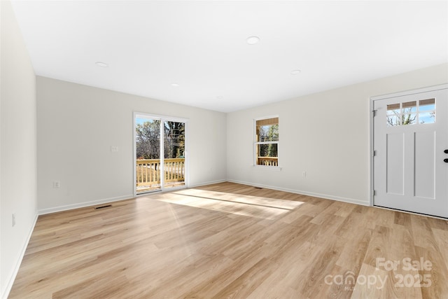 entrance foyer with light wood-type flooring