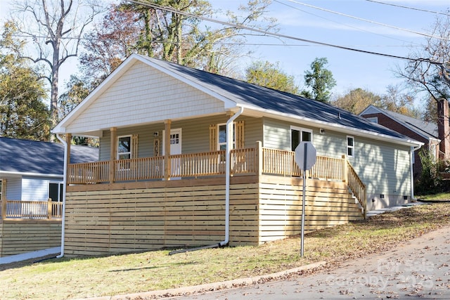 ranch-style house featuring a porch