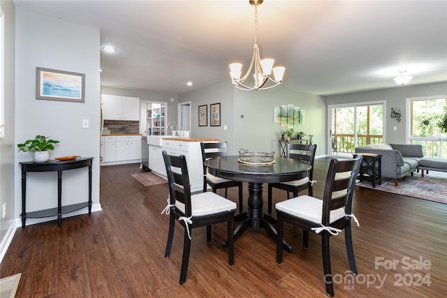 dining area with an inviting chandelier, visible vents, dark wood finished floors, and recessed lighting