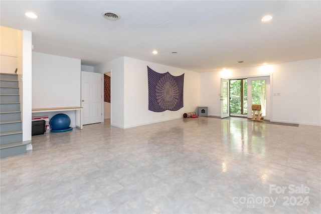 interior space with recessed lighting, visible vents, and baseboards