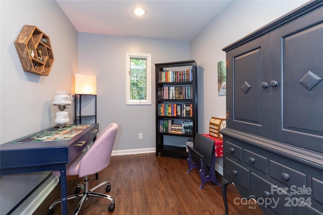 home office featuring dark wood-type flooring and baseboards