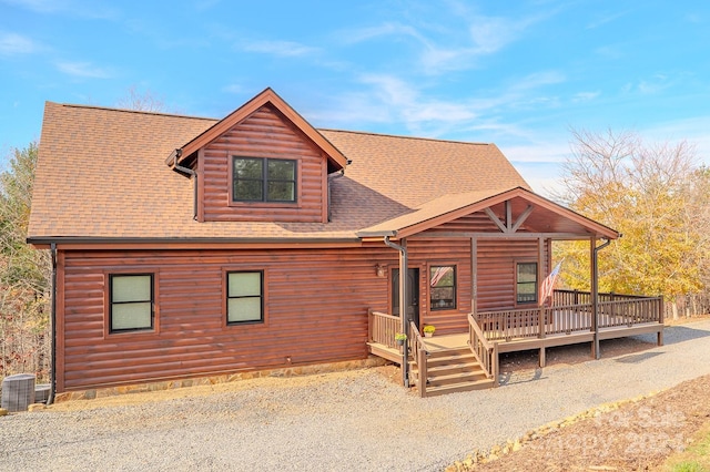 view of front of home featuring central AC and a deck