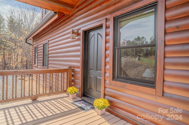 entrance to property with covered porch