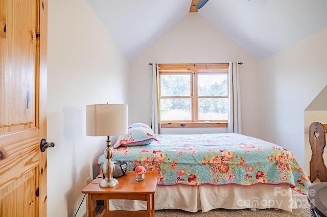 carpeted bedroom with vaulted ceiling