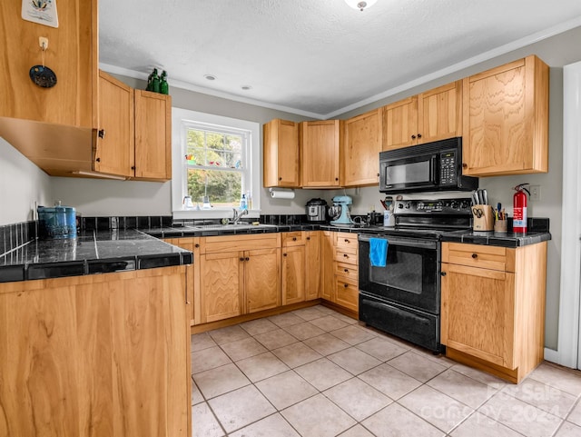 kitchen featuring black appliances, light tile patterned flooring, and ornamental molding