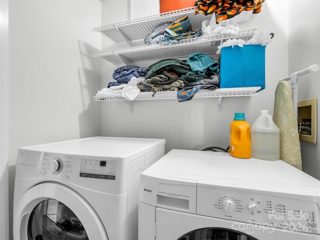 laundry area with washer and dryer