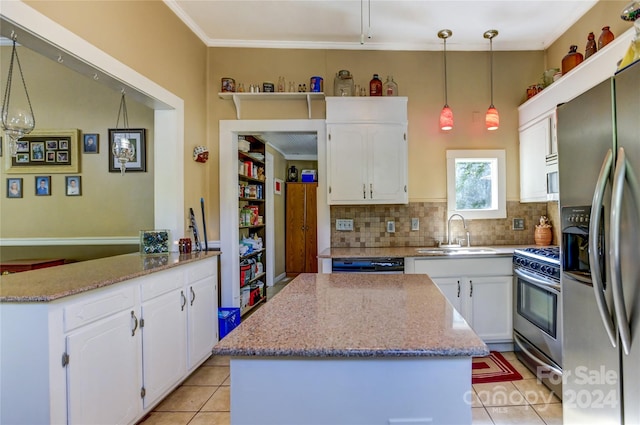 kitchen featuring stainless steel appliances, decorative backsplash, sink, white cabinets, and light tile patterned floors