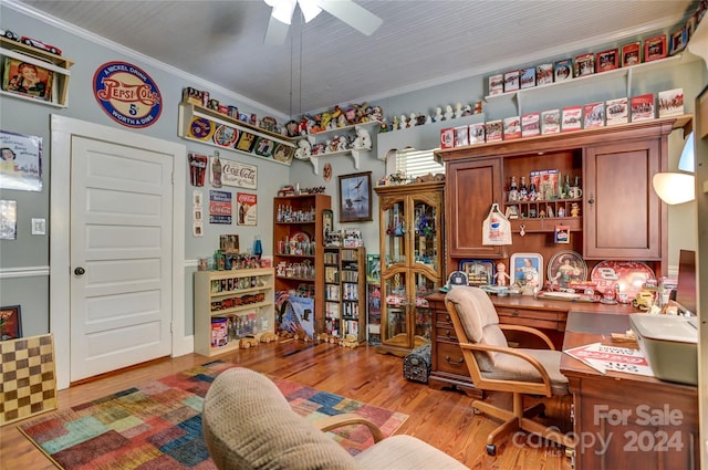 office space featuring ceiling fan, light hardwood / wood-style flooring, and ornamental molding