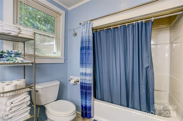 bathroom featuring ornamental molding, shower / tub combo with curtain, and toilet