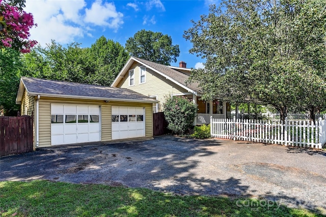 view of front of property featuring a garage