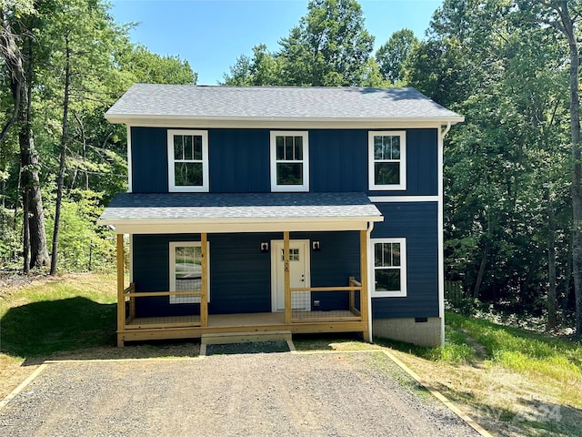 view of property with a porch