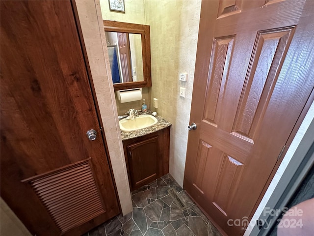 113 Hummingbird Cir, New London, NC 28127 - bathroom with vanity, a textured wall, and visible vents