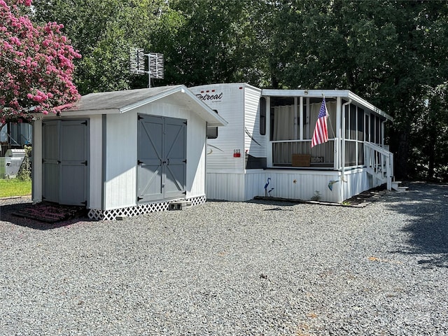 113 Hummingbird Cir, New London, NC 28127 - view of front of property with a shed and an outbuilding