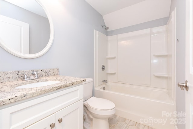 full bathroom with toilet, shower / bath combination, lofted ceiling, and vanity