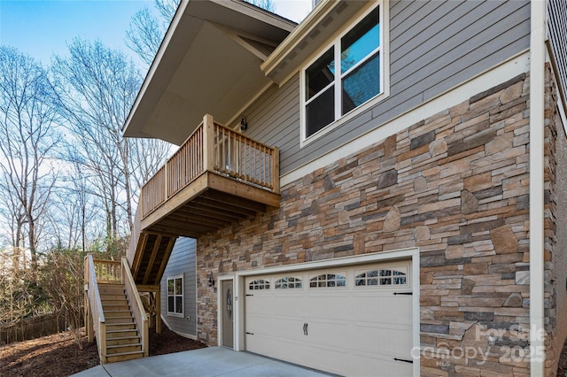 view of side of property with a balcony