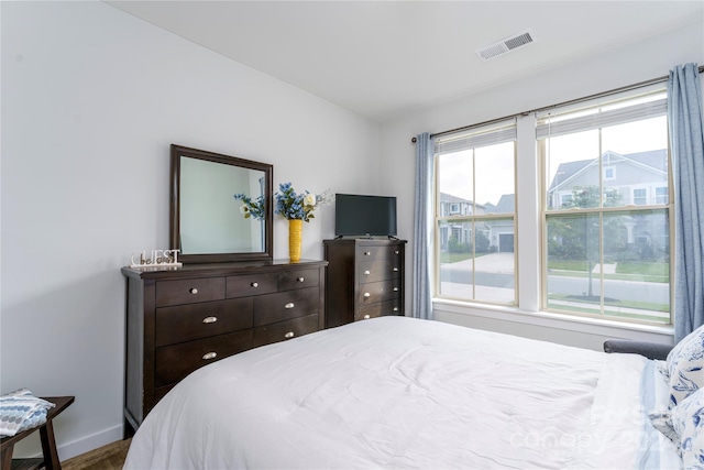 bedroom featuring hardwood / wood-style floors