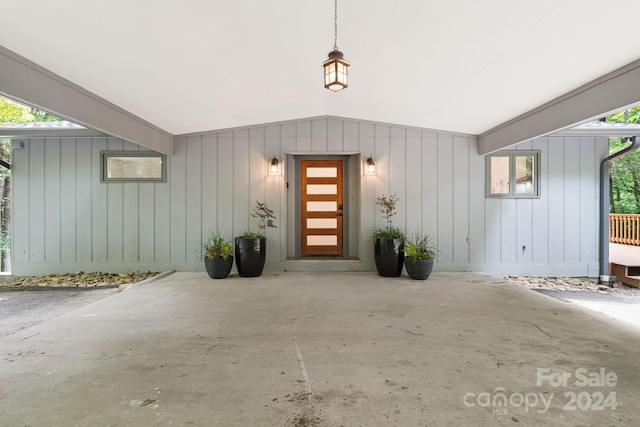 doorway to property with a patio area