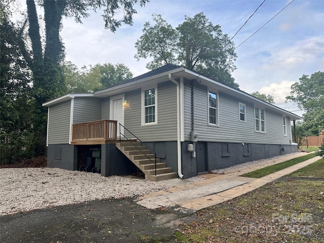 view of front of home with stairway