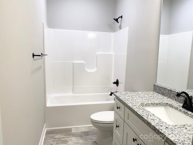 full bathroom with baseboards, shower / tub combination, vanity, and toilet