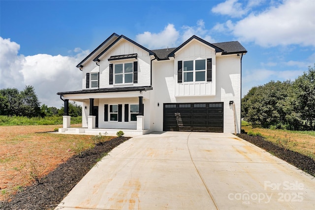 modern farmhouse style home with covered porch and a garage