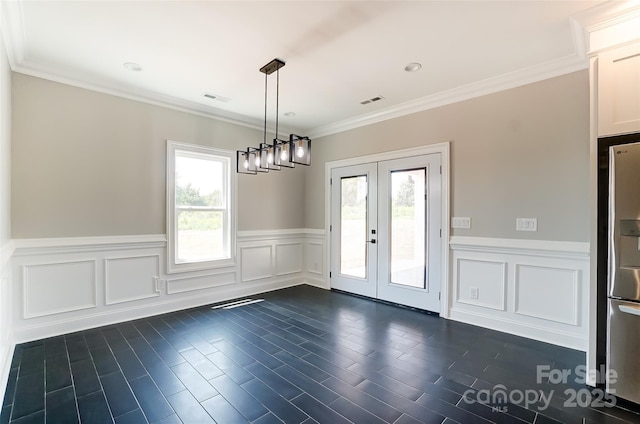 interior space featuring french doors and ornamental molding