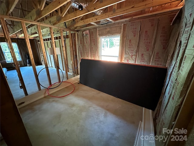 miscellaneous room with concrete flooring