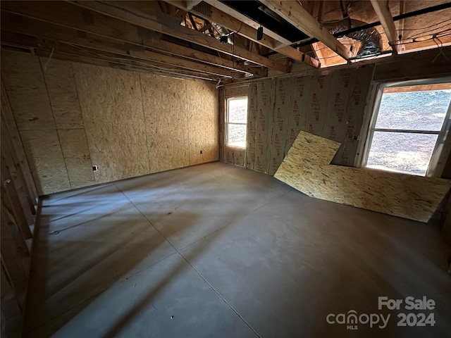 interior space featuring concrete floors