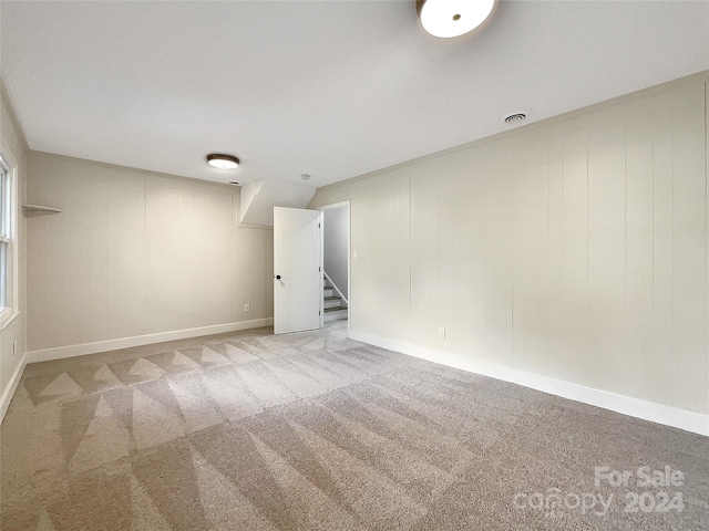 unfurnished bedroom with light carpet