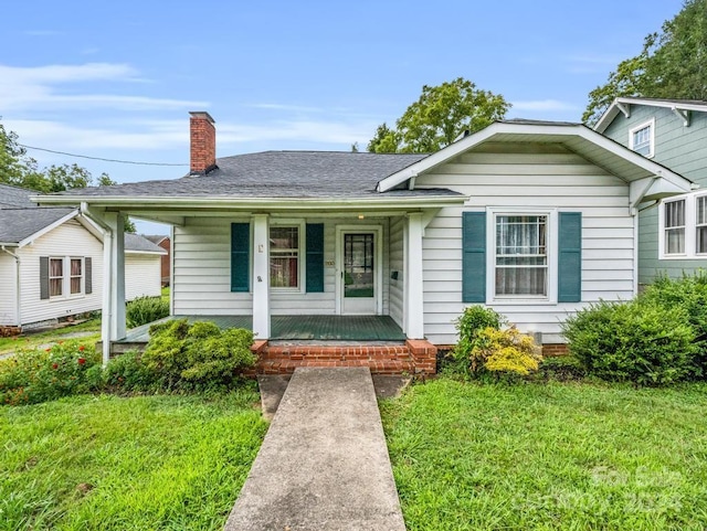 203 Court St, Rutherfordton, NC 28139 - view of front of home featuring a front yard and covered porch