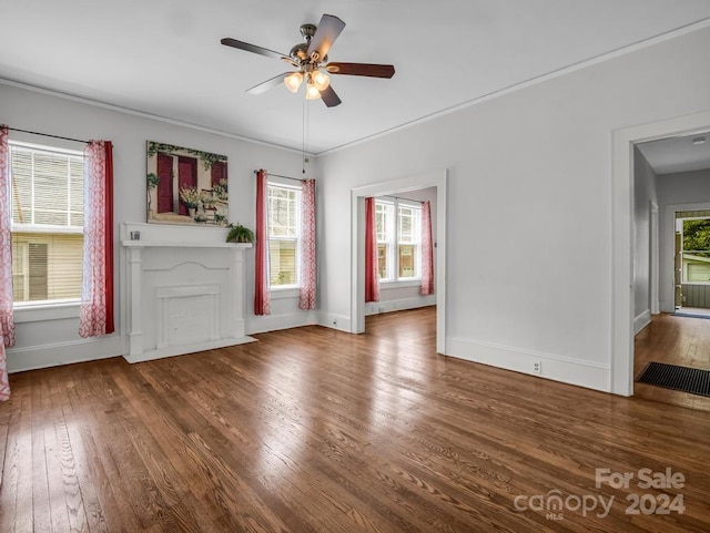 unfurnished living room featuring ceiling fan and hardwood / wood-style floors