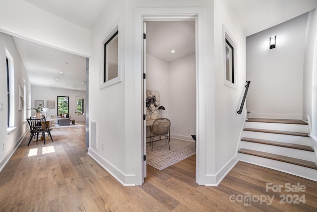 hallway featuring hardwood / wood-style flooring