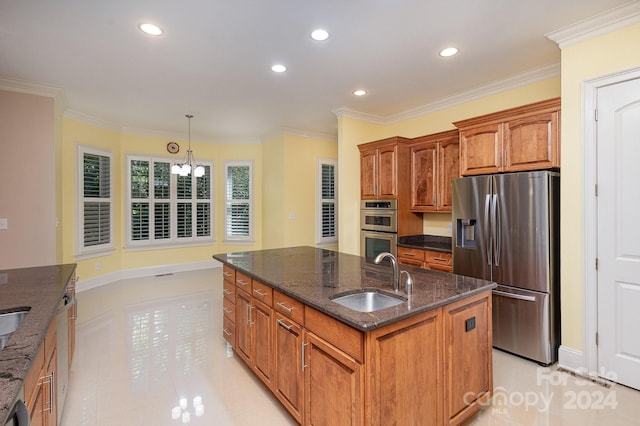 kitchen with appliances with stainless steel finishes, a kitchen island with sink, ornamental molding, and sink