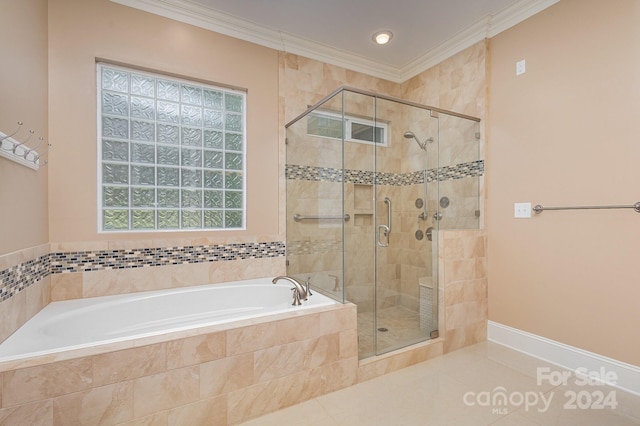 bathroom featuring tile patterned floors, separate shower and tub, and crown molding